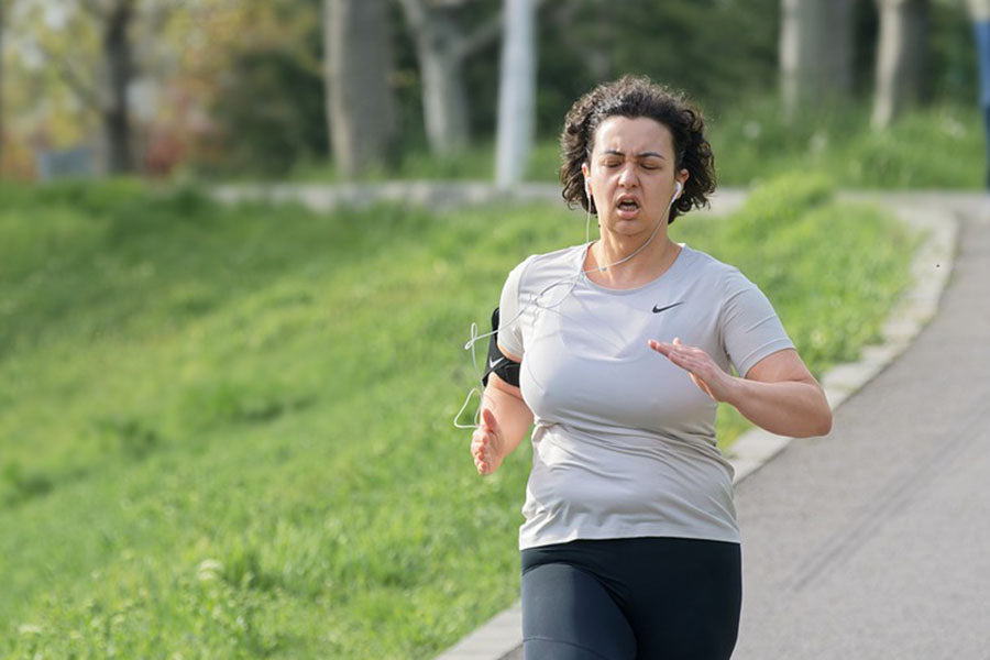 running lady with headphones