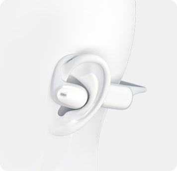 Runner wearing AirWave Pro2 open-ear sports headphones while staying aware of the surroundings